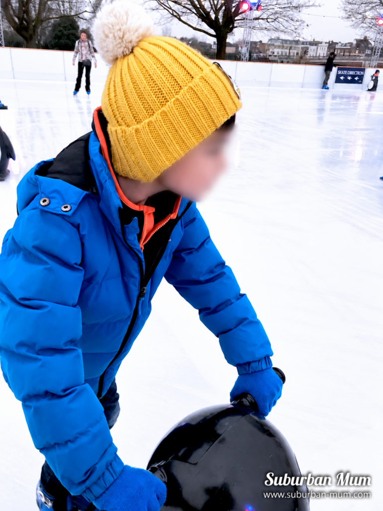 Child ice skating at Hampton Court Palace Ice Rink