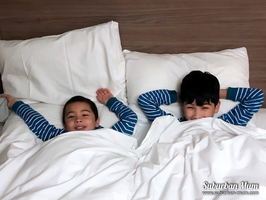 boys-double-bed-hotel-room