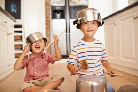 brothers playing in kitchen