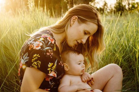 mum and baby in field