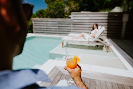 couple by swimming pool