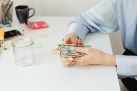 woman holding money