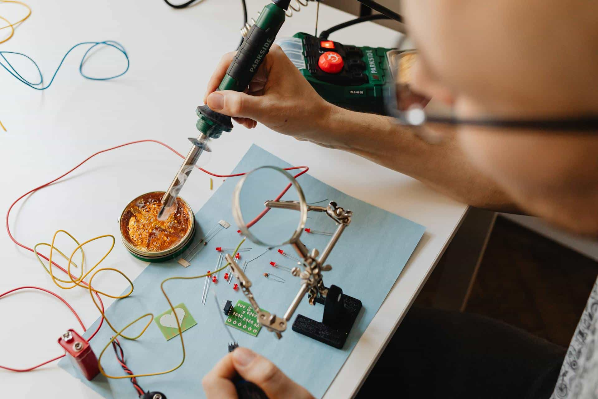 person soldering