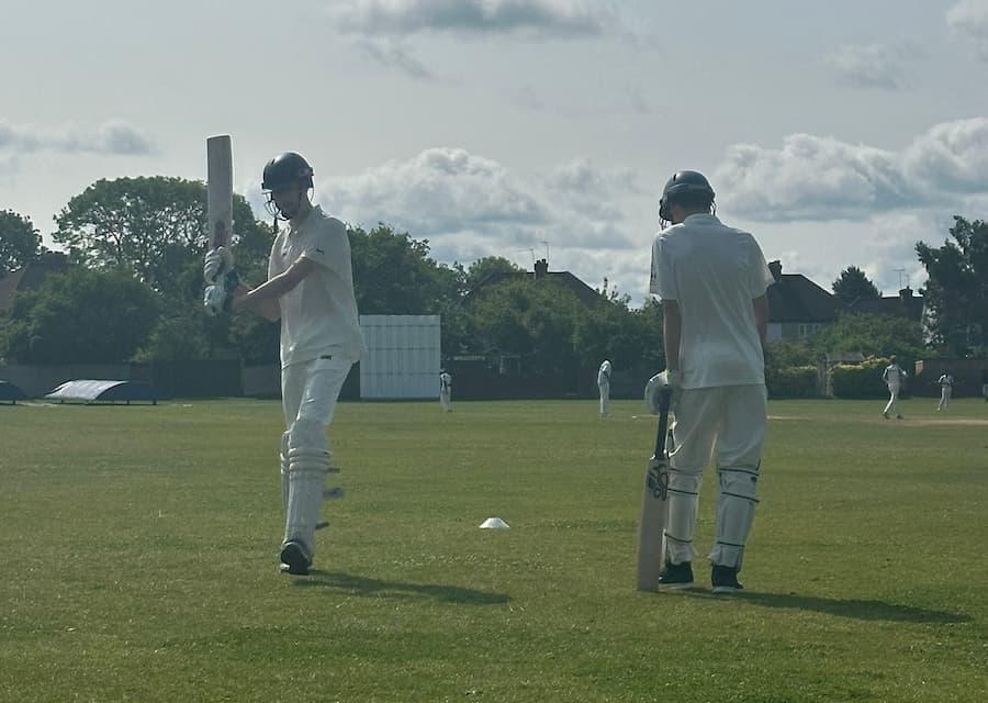 boys playing cricket