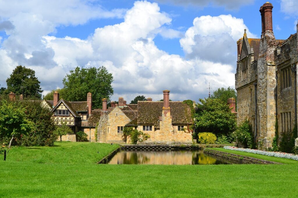 an image of hever castle showing the castle and some of the grounds