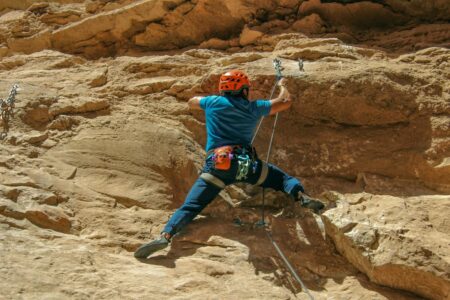man rock climbing outdoors