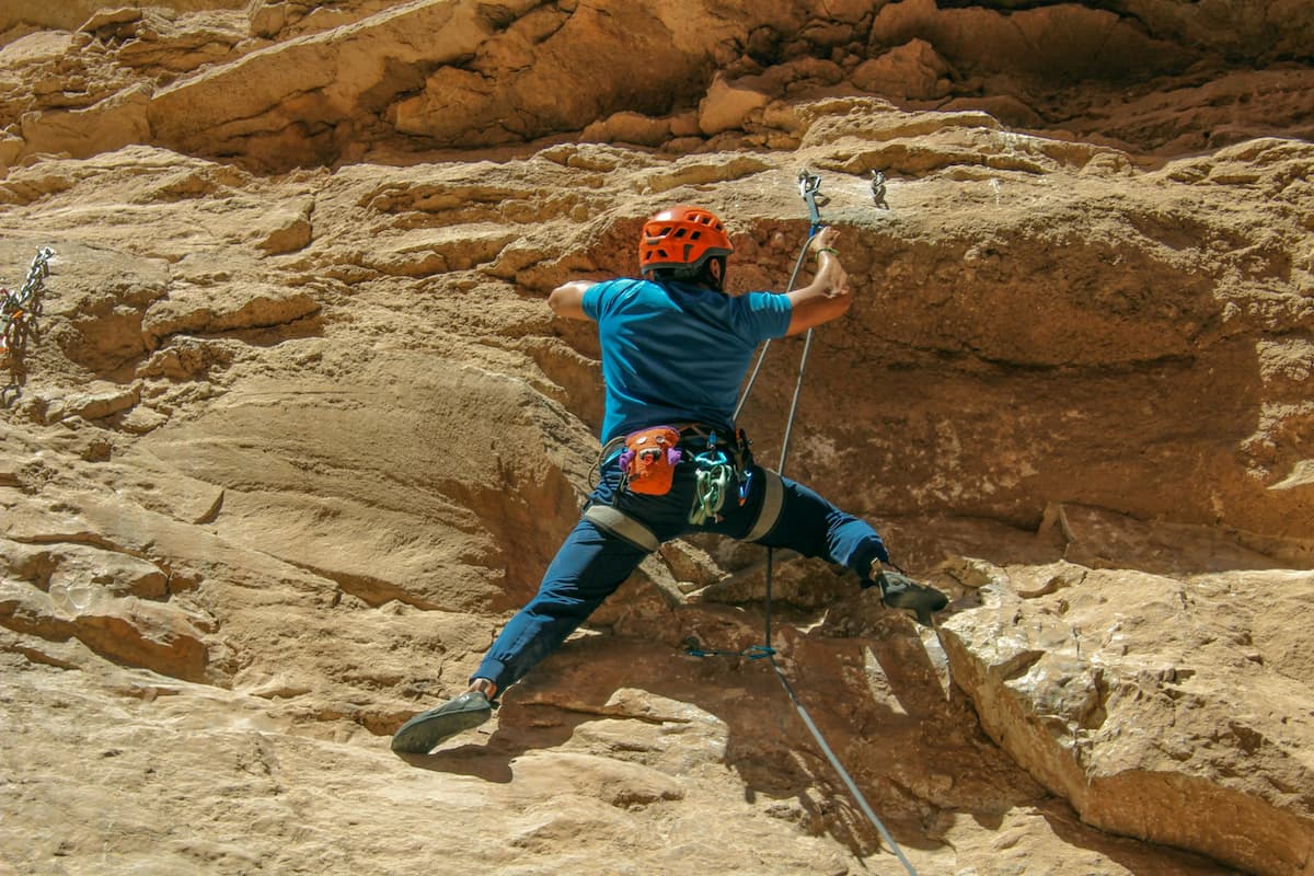 man rock climbing outdoors