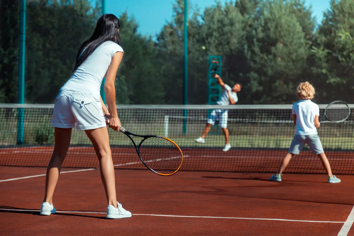 family playing tennis after wimbledon