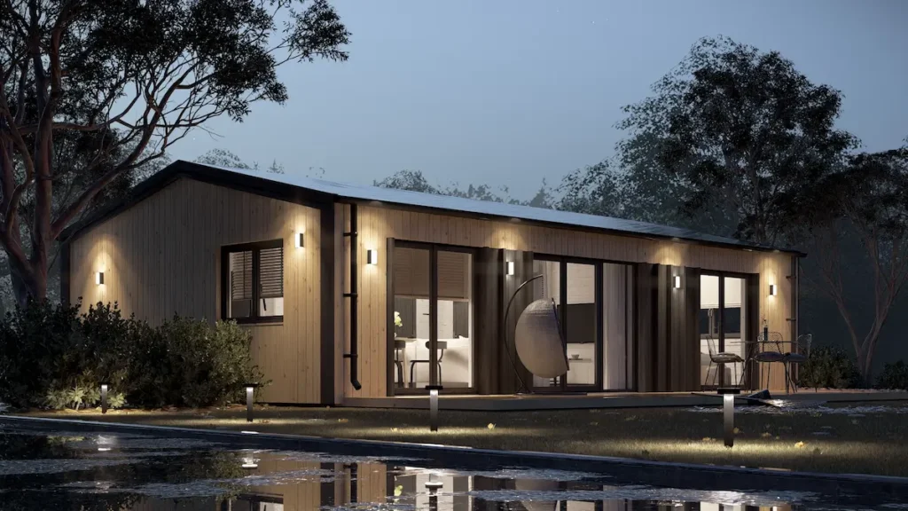 modern-log-cabin-uk-at-night Modern timber log cabin designed for year-round living in the UK.